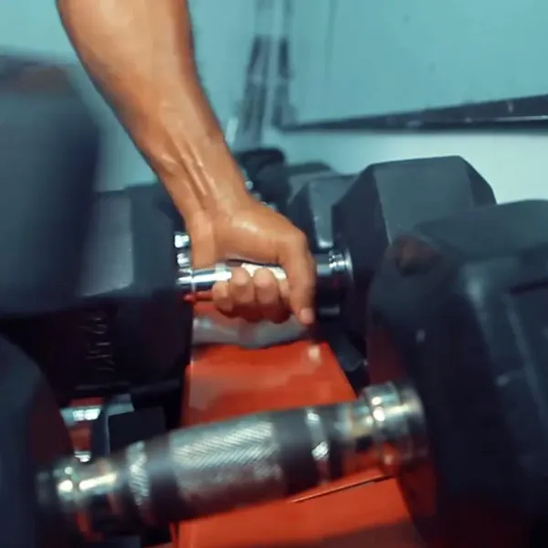 Dumbbell rack in the free weights area at Power Gym